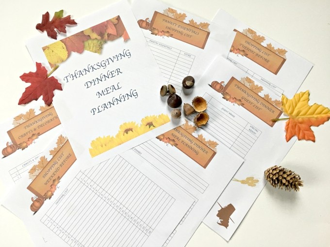 Papers on a table with Thanksgiving organization stuff printed on them